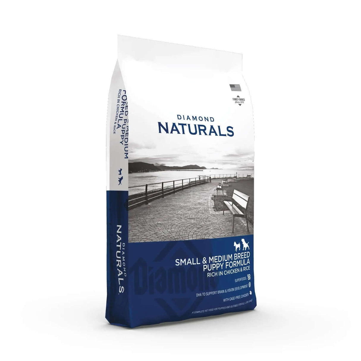 Diamond Naturals Small and Medium Breed Puppy Formula Rich in Chicken and Rice Dry Dog Food packaging on a scenic background.