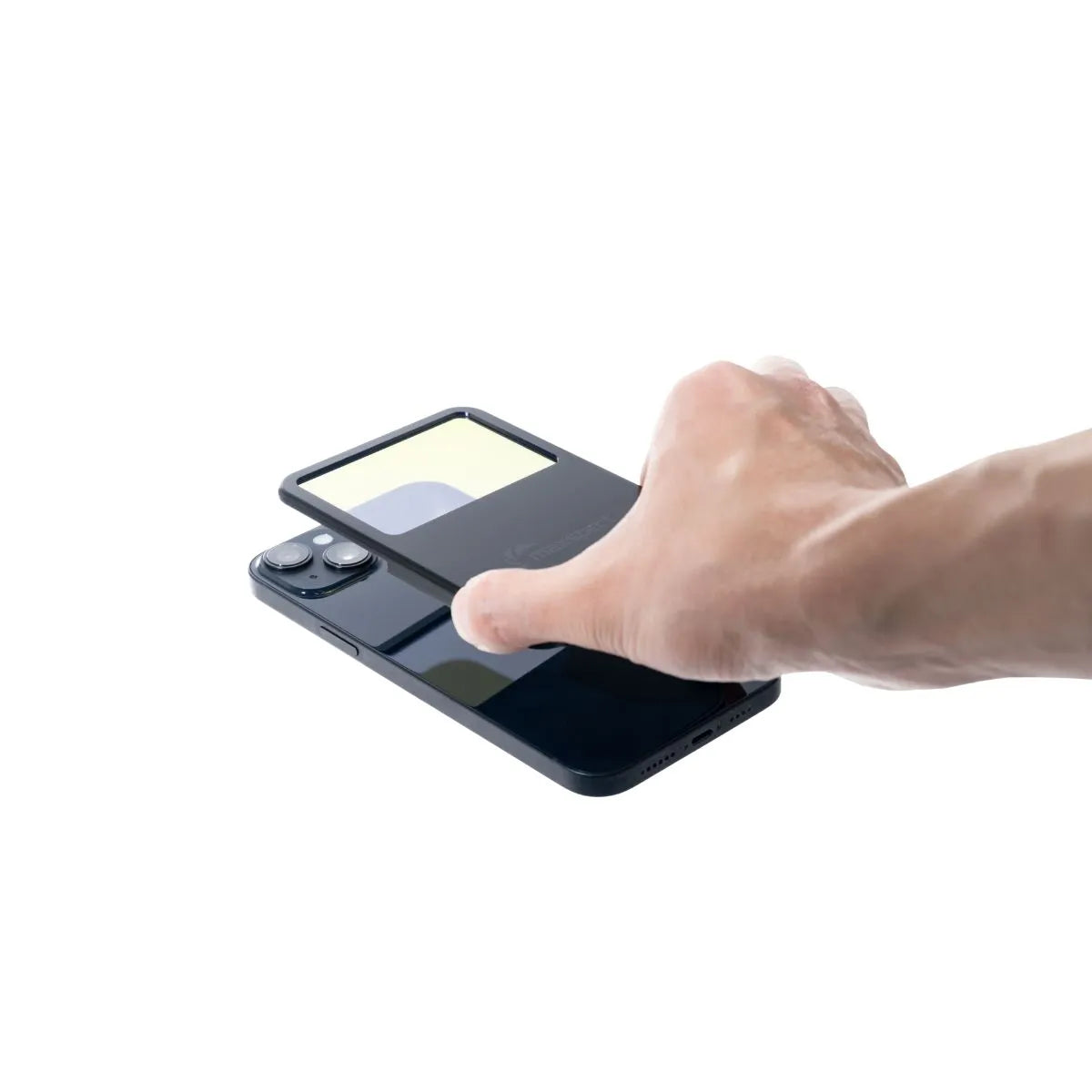 Maxspect TrueReef Filter Lens magnetically attaching to iPhone for vibrant coral photography.