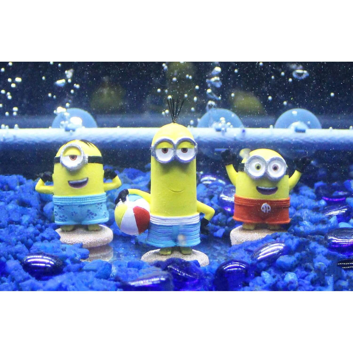 Penn-Plax Minions Officially Licensed trio of Minion figurines with beach theme in aquarium setting.