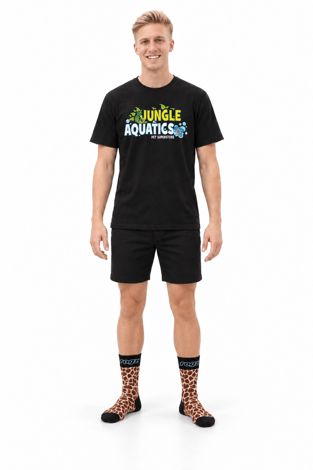 Model wearing Rogz x Versus Safari Socks in Giraffe print, showcasing fun pet-and-owner style.