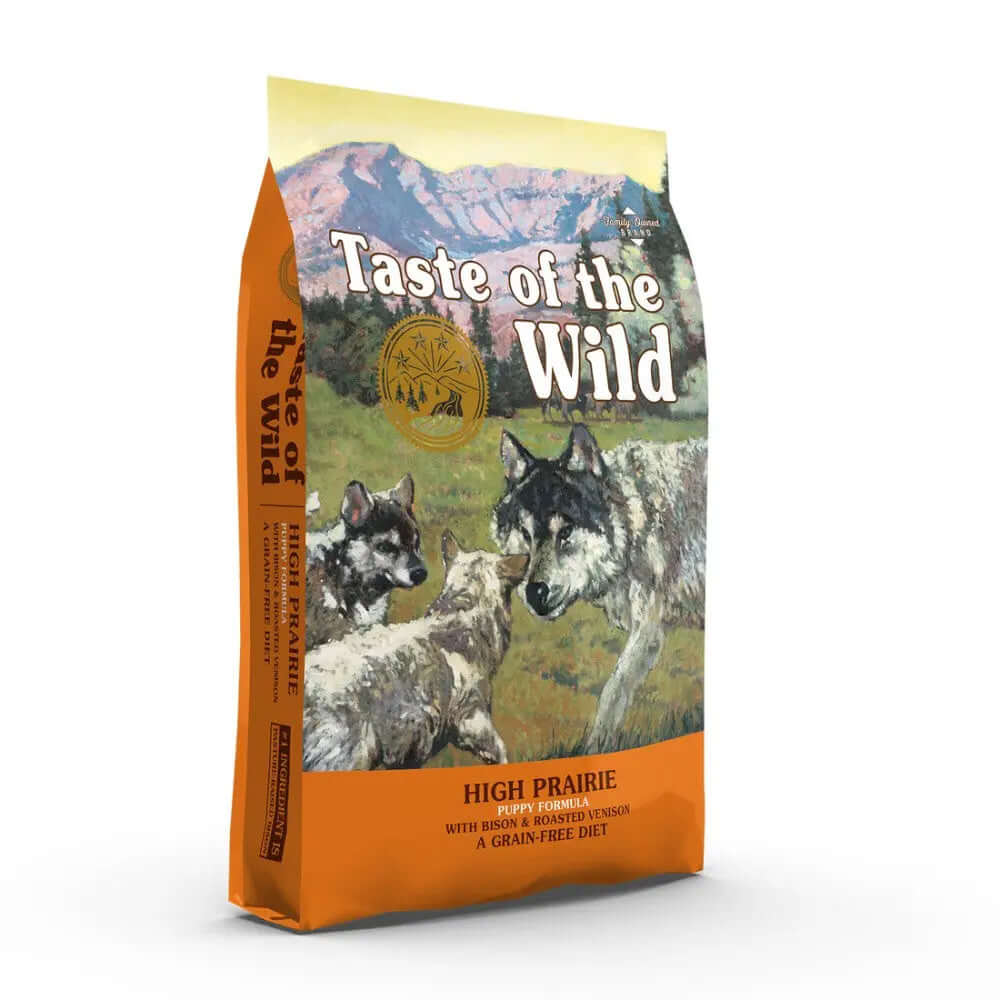 Taste of the Wild Canine High Prairie Puppy Dry Food bag featuring wolves in a natural setting.