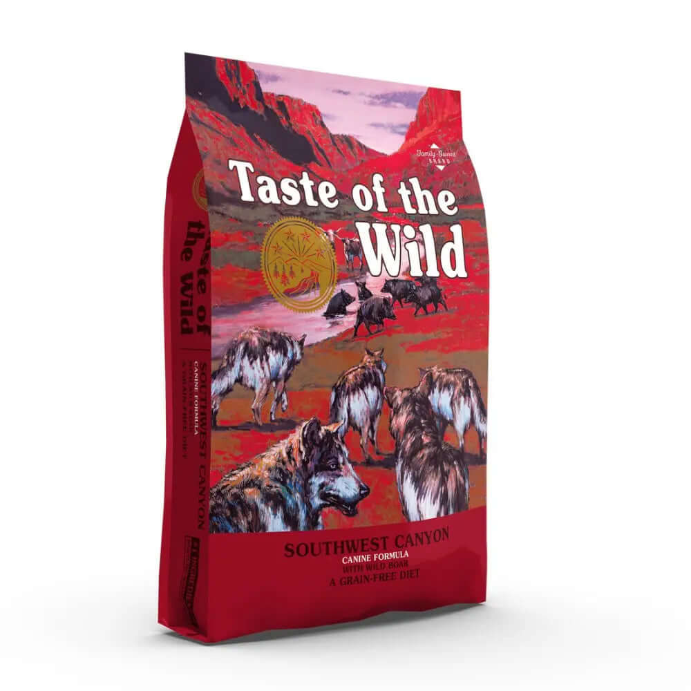 Taste of the Wild Canine Southwest Canyon Dry Food bag showcasing a wilderness scene with wolves.