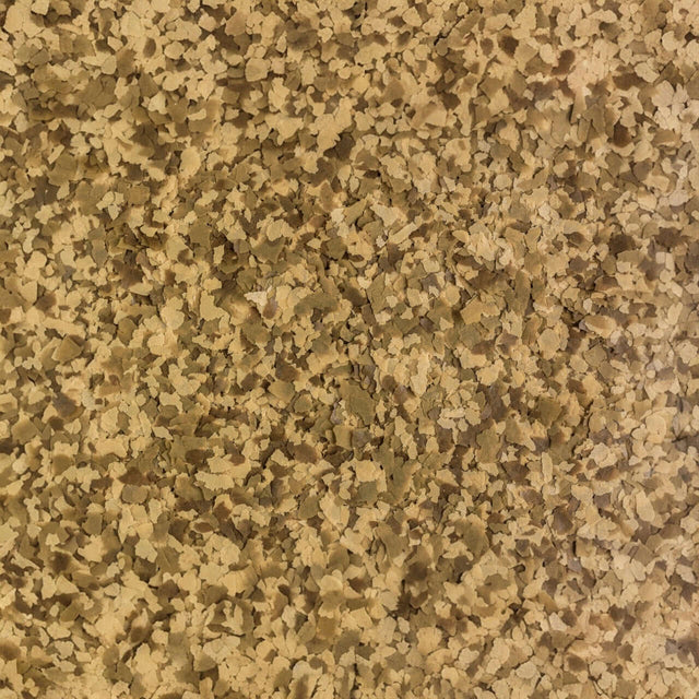 Close-up of Tetra Goldfish Flakes, nutritious flakes for goldfish and coldwater fish, promoting health and vitality.