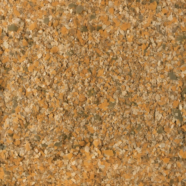 Tetramin Tropical Flakes for ornamental fish, offering a high-quality mix of nutrients for growth and vibrant color.