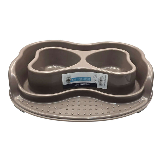 Anti-Ant Two Feeder Bowl in beige plastic with raised rim and textured base, designed to keep pet food pest-free.