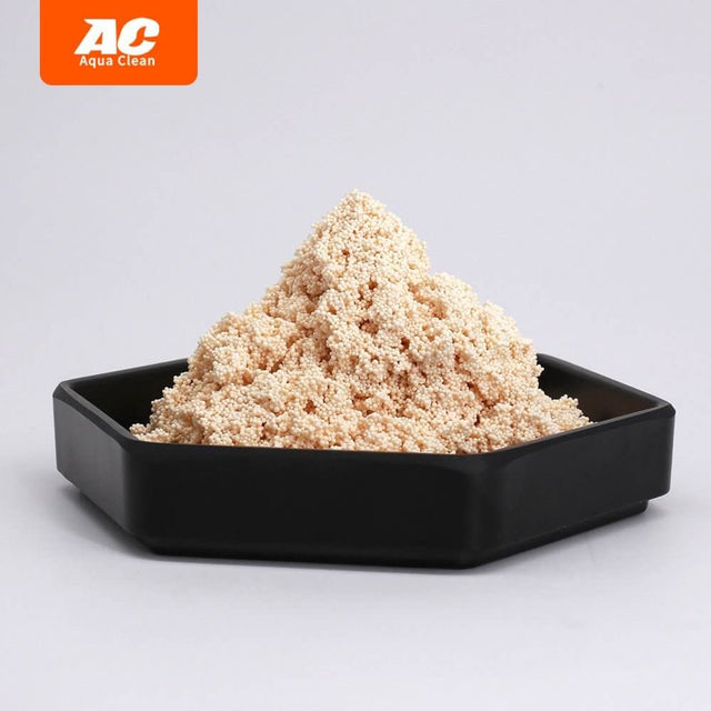 Aqua Clean Organic Remover in a black dish, showcasing the macro-porous polymer used for water filtration.