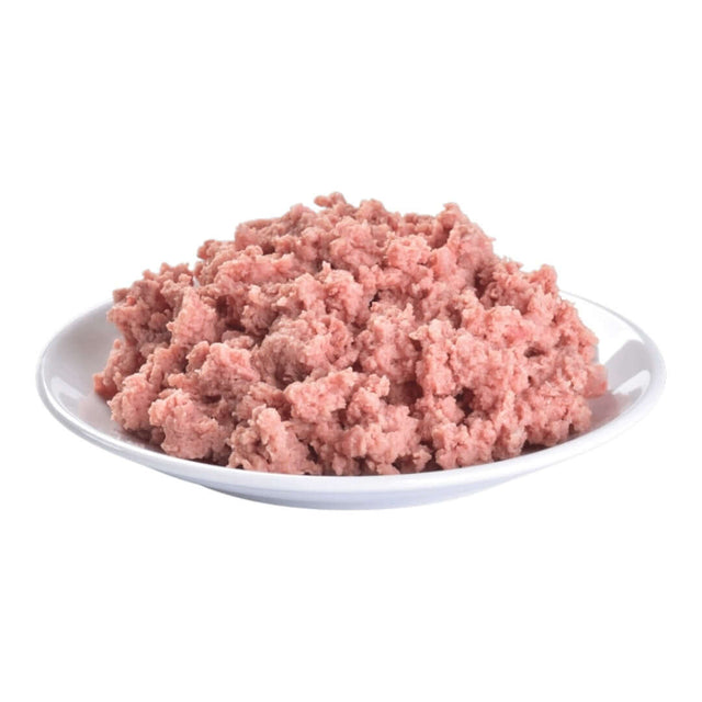 Plate of Brit Premium wet dog food paté, ideal for adult dogs, enriched with meat and easy-to-digest ingredients.