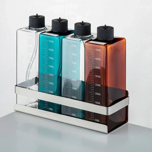 Chihiros 4 dosing containers with holder, featuring clear and colored bottles for accurate liquid measurement.