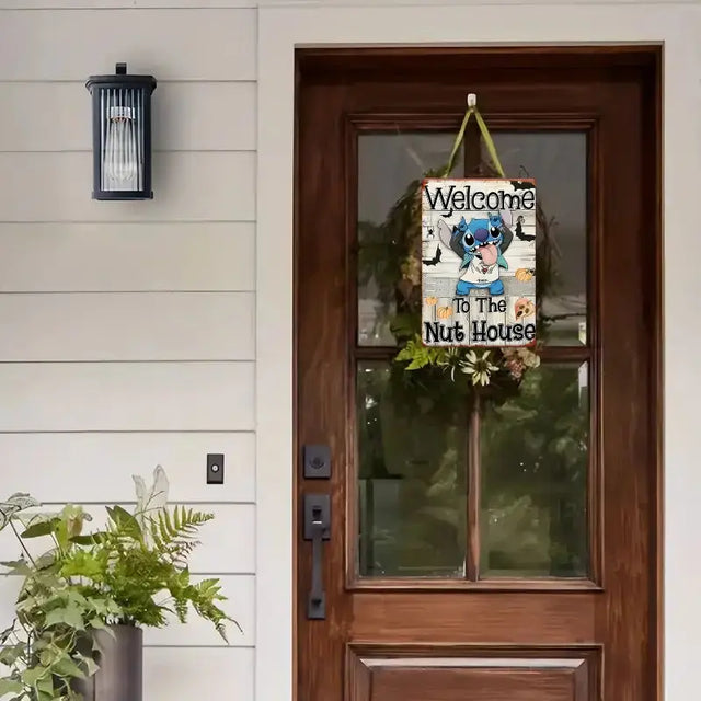 Stitch Welcome Sign hanging on a door, adding a playful touch to home décor with Halloween theme.