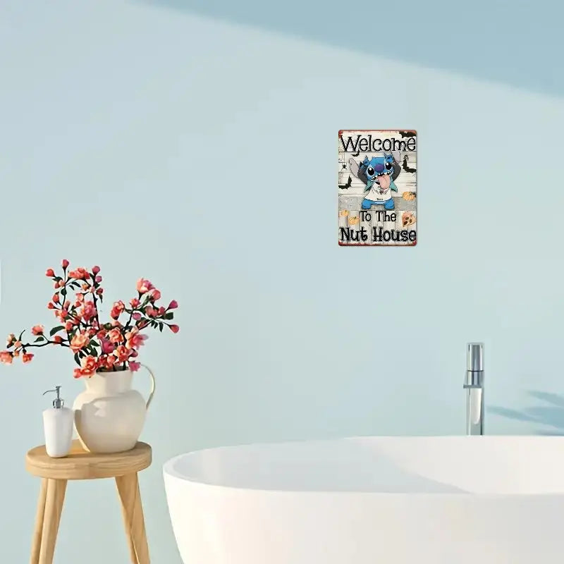 Disney Stitch Welcome sign in a bathroom setting, featuring a playful 'Welcome To The Nut House' design.