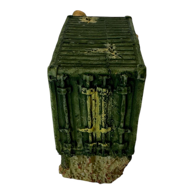 Green truck aquarium ornament with textured, weathered surfaces for realistic aquatic decor.