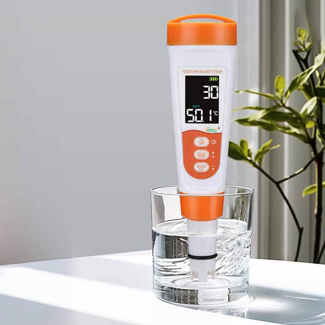 Hygger Water Quality Meter measuring water quality in a glass, showing TDS and temperature readings on LCD.