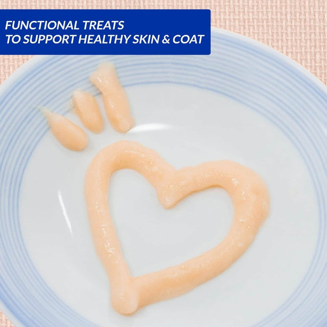 Inaba Churu Cat Treats shaped in a heart on a plate, promoting healthy skin and coat for cats.