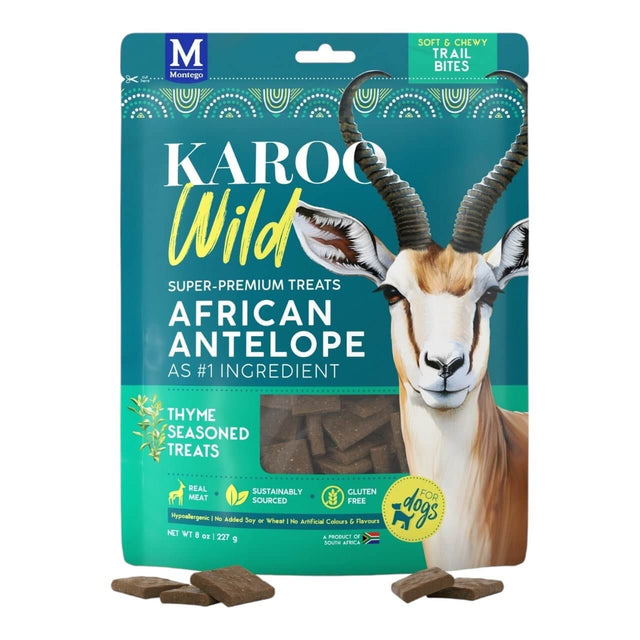 Karoo Wild Trail Bites dog treats, featuring African antelope, thyme seasoned, soft and chewy, 227g packaging.