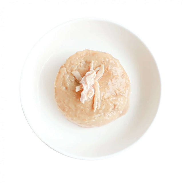 Kit Cat Tuna Mousse with Chicken Topper served in a white bowl, showcasing a creamy texture and chicken pieces.