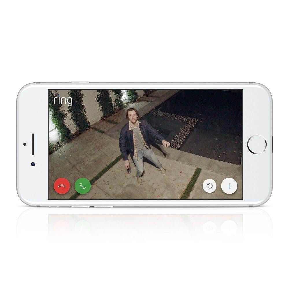 Live view of Ring battery-operated security camera on smartphone showing a person outside, enhancing home security.