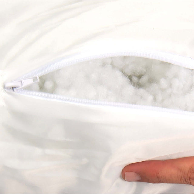 Close-up of the zippered opening of a dog bed, showing plush filling and soft fabric for comfort.