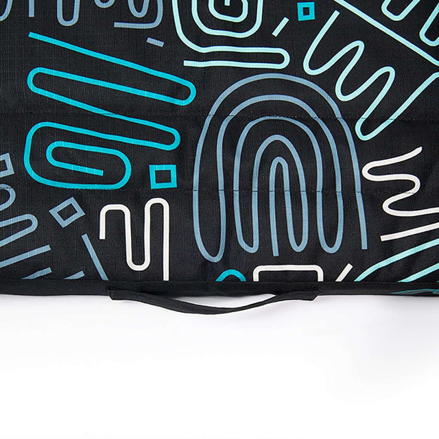 Rogz Graphix Flat Dog Bed featuring bold, colorful abstract patterns on a durable polycotton fabric.