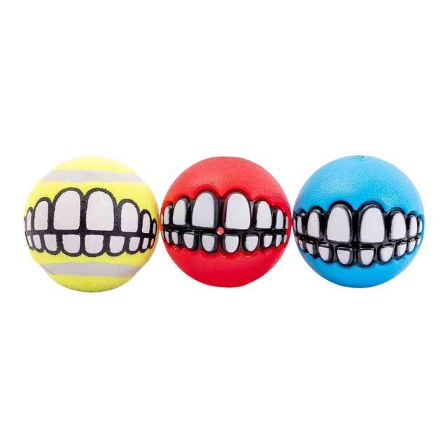 Rogz Grinz Dog Toy Variety Pack featuring yellow, red, and blue fetch balls with playful tooth designs.