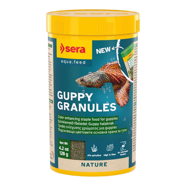 Sera Guppy Granules color enhancing food for guppies in yellow container, promoting health and vibrant colors.
