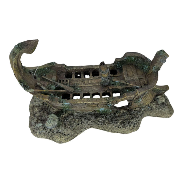 Detailed shipwreck aquarium ornament on rocky base, perfect for enhancing underwater themes in aquariums.