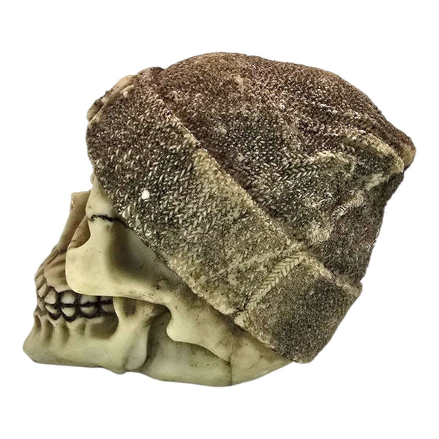 Skull aquarium ornament with a cozy brown beanie, featuring intricate details and a weathered cream finish.