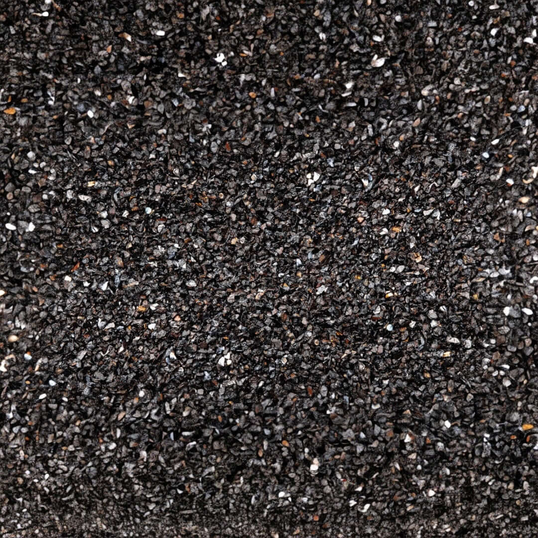 Close-up of UNS Controsand Maui, a natural black substrate for freshwater aquariums and terrariums.
