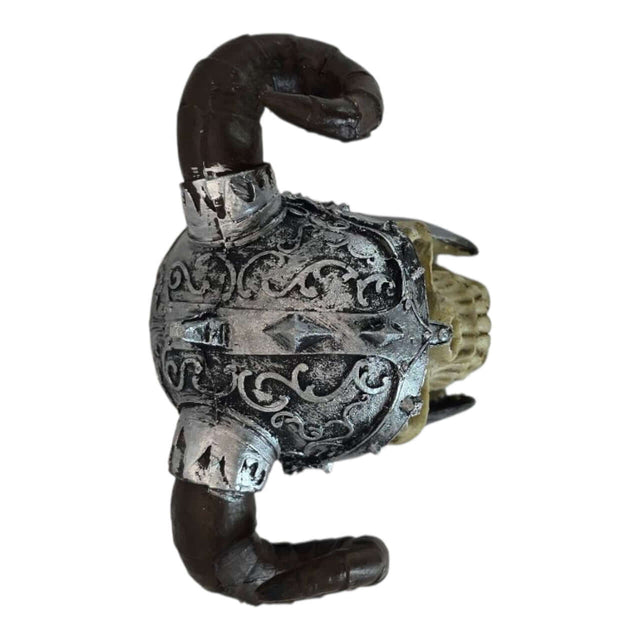 Viking skull aquarium ornament with decorative helmet and horns, showcasing intricate details and a unique design.