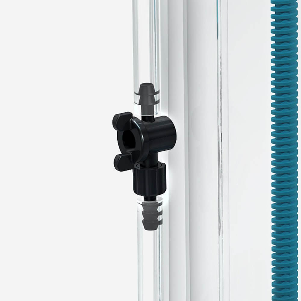 Close-up of Aquavitro element Ca Calcium Reactor valve and tubing for efficient calcium maintenance in reef aquaria.