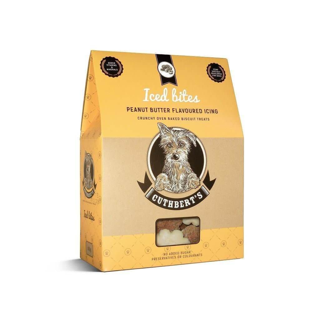Cuthbert's Iced Dog Biscuits in peanut butter flavor, 650g packaging with crunchy baked treats and icing.