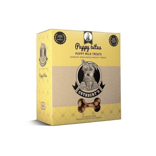 Cuthberts Puppy Milk Biscuits packaging, featuring a playful puppy graphic and a delicious treat design.