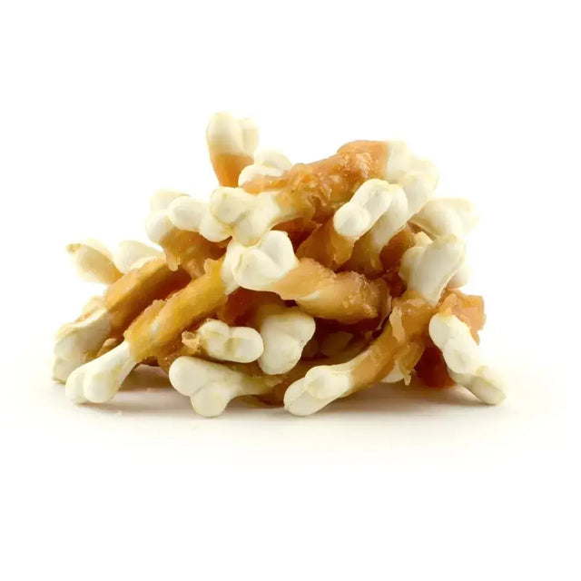 Dog Fest Calcium Bones with Chicken treats stacked on white background, ideal for small dogs' dental health.