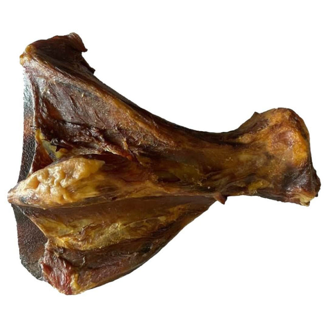 Air-dried raw scapula bone dog treat, 100% natural meat, no grains or fillers, single ingredient protein.