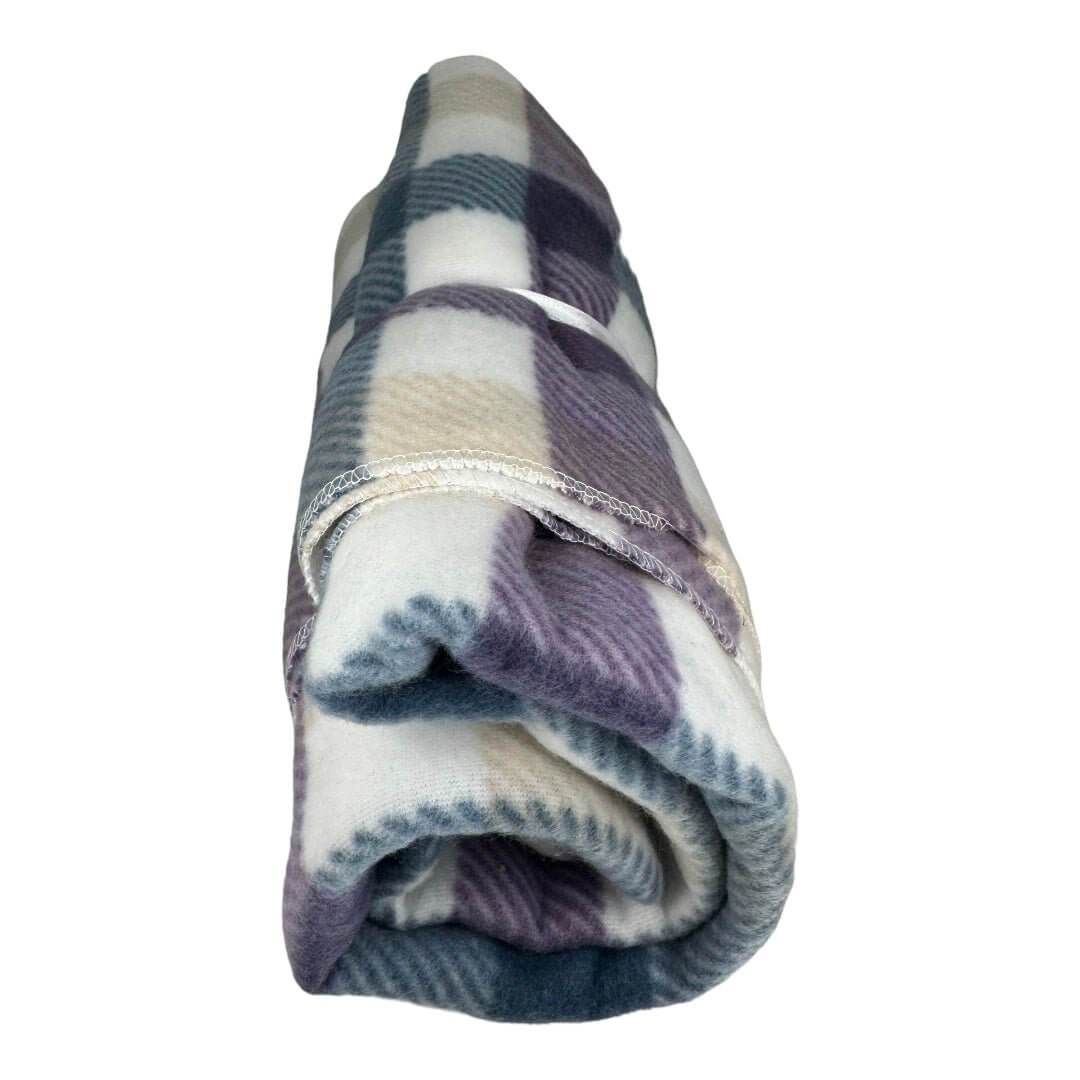 Rolled fleecy pet blanket in assorted colors and plaid design, measuring 1m x 1.5m, perfect for pets.