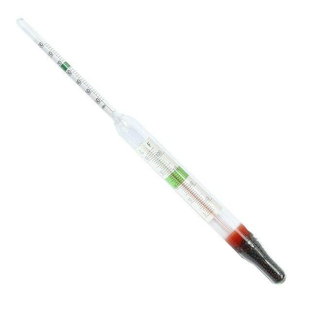 Floating aquarium glass hydrometer with thermometer for precise water measurements.