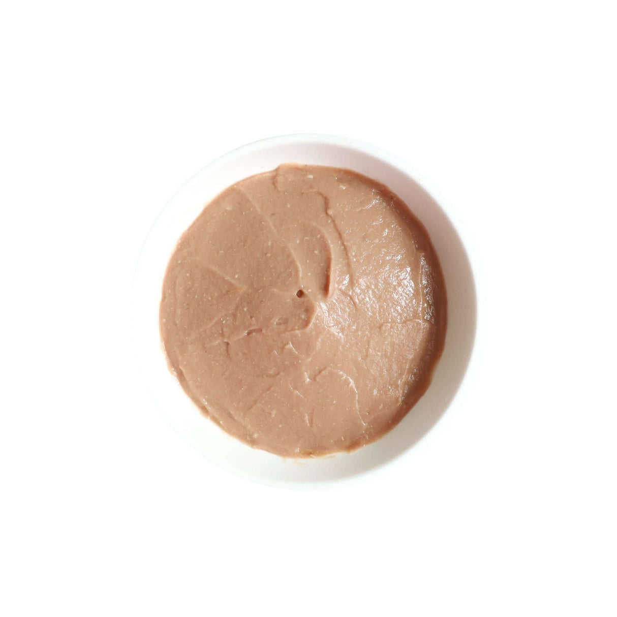 Smooth tuna puree for cats, featuring natural ingredients and no added colors or preservatives.