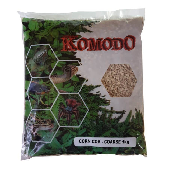 Komodo Corn Cob substrate 1kg, natural bedding for reptiles, birds, and rodents, designed for a safe habitat environment.