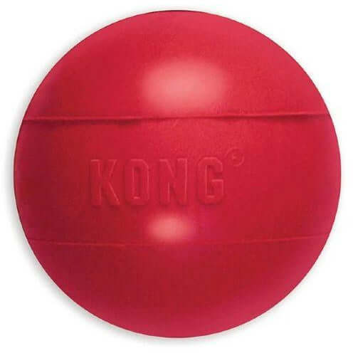 KONG red ball with hole, durable dog toy for fetch and chewing, high-bouncing and puncture-resistant.