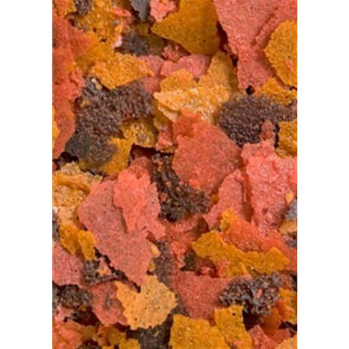 Colorful flakes of Ocean Nutrition Brine Shrimp Plus, a gourmet food for tropical and marine fish, rich in protein and nutrients.