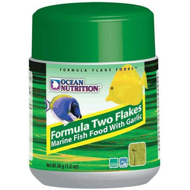 Ocean Nutrition Formula Two Flakes fish food with garlic, ideal for marine and freshwater herbivorous fish. 34g container.
