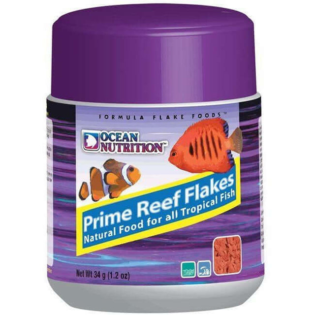 Ocean Nutrition Prime Reef Flake jar, 34g, nutritious fish food for tropical fish, featuring vibrant packaging and graphics.