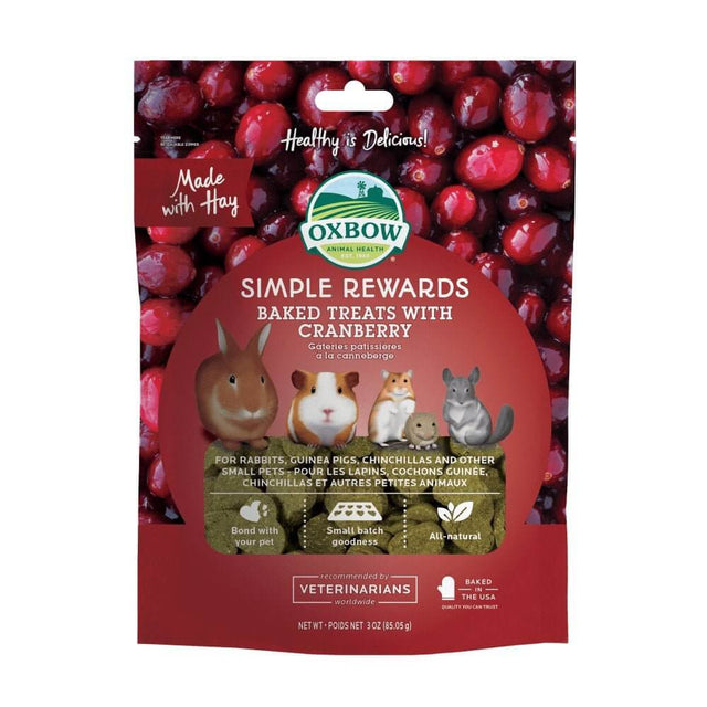 Oxbow Simple Rewards Baked Treats with Cranberry 85g packaging, featuring small pets and cranberries for wholesome nutrition.