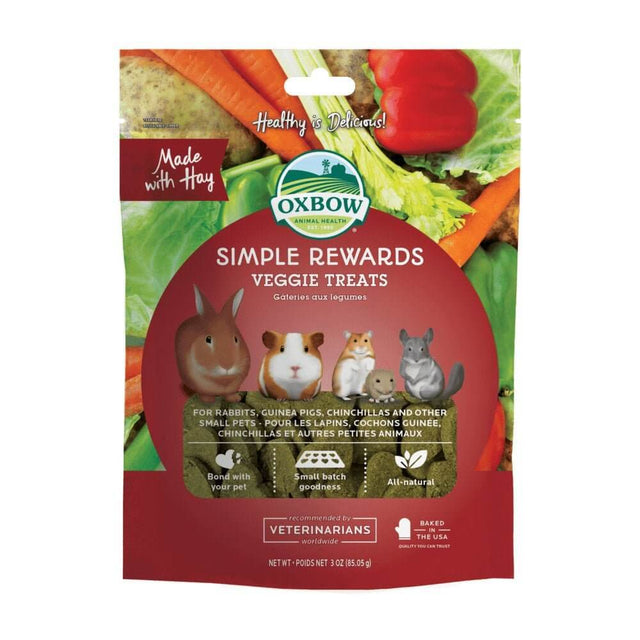 Oxbow Simple Rewards Baked Veggie Treats 85g packaging featuring small animals and fresh vegetables for healthy pet snacks.