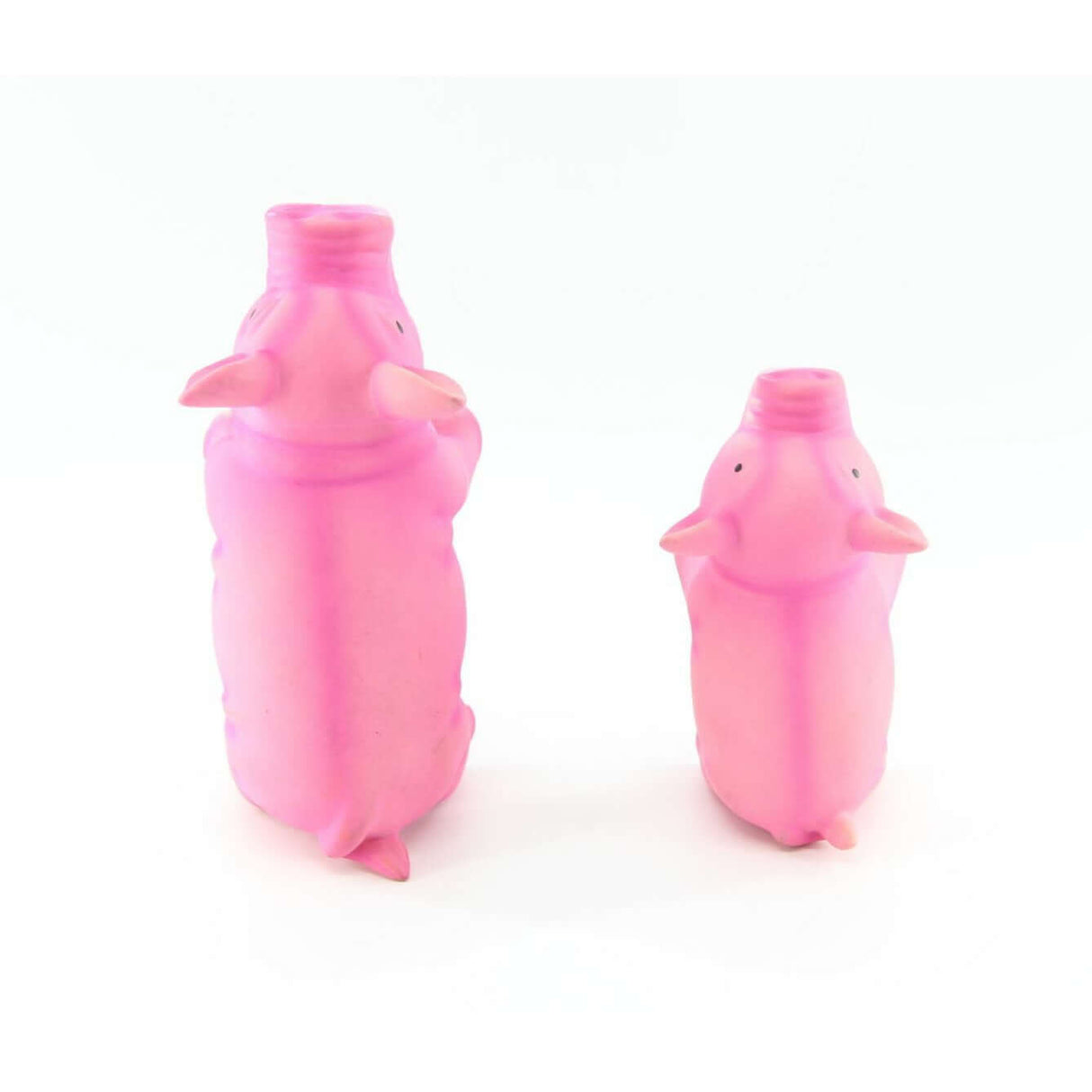 Pink latex pig dog toys in small and large sizes, designed for fun squeaky sounds and playful pet enjoyment.