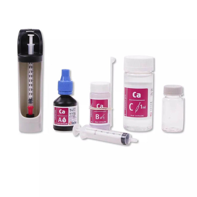 Red Sea Calcium Pro Reef Test Kit components including titration syringe and reagent bottles for accurate calcium measurement.