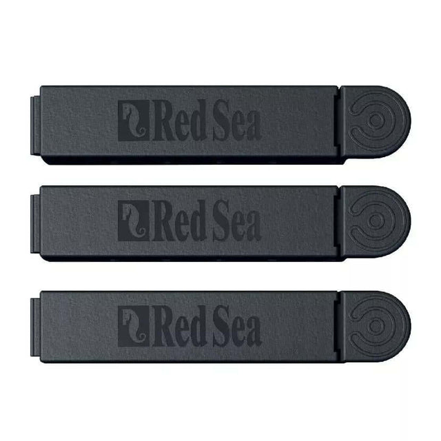 Red Sea ReefDose Tube Organizer Clips in black, three-pack design for secure tubing management in aquariums.