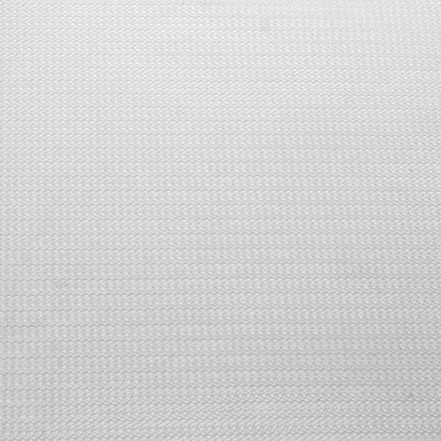 close-up of a textured white fabric surface with a subtle grid pattern