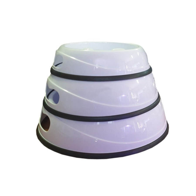 Slow feeding pet bowl designed with ridges to promote healthy eating habits and slow down pet feeding pace.