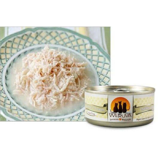 Weruva Paw Lickin Chicken Wet Cat Food served in a bowl next to its can, showcasing tender shredded chicken in broth.