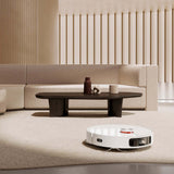 Xiaomi Robot Vacuum X10 Plus Demo Secondhand Model working in a modern living room setting.